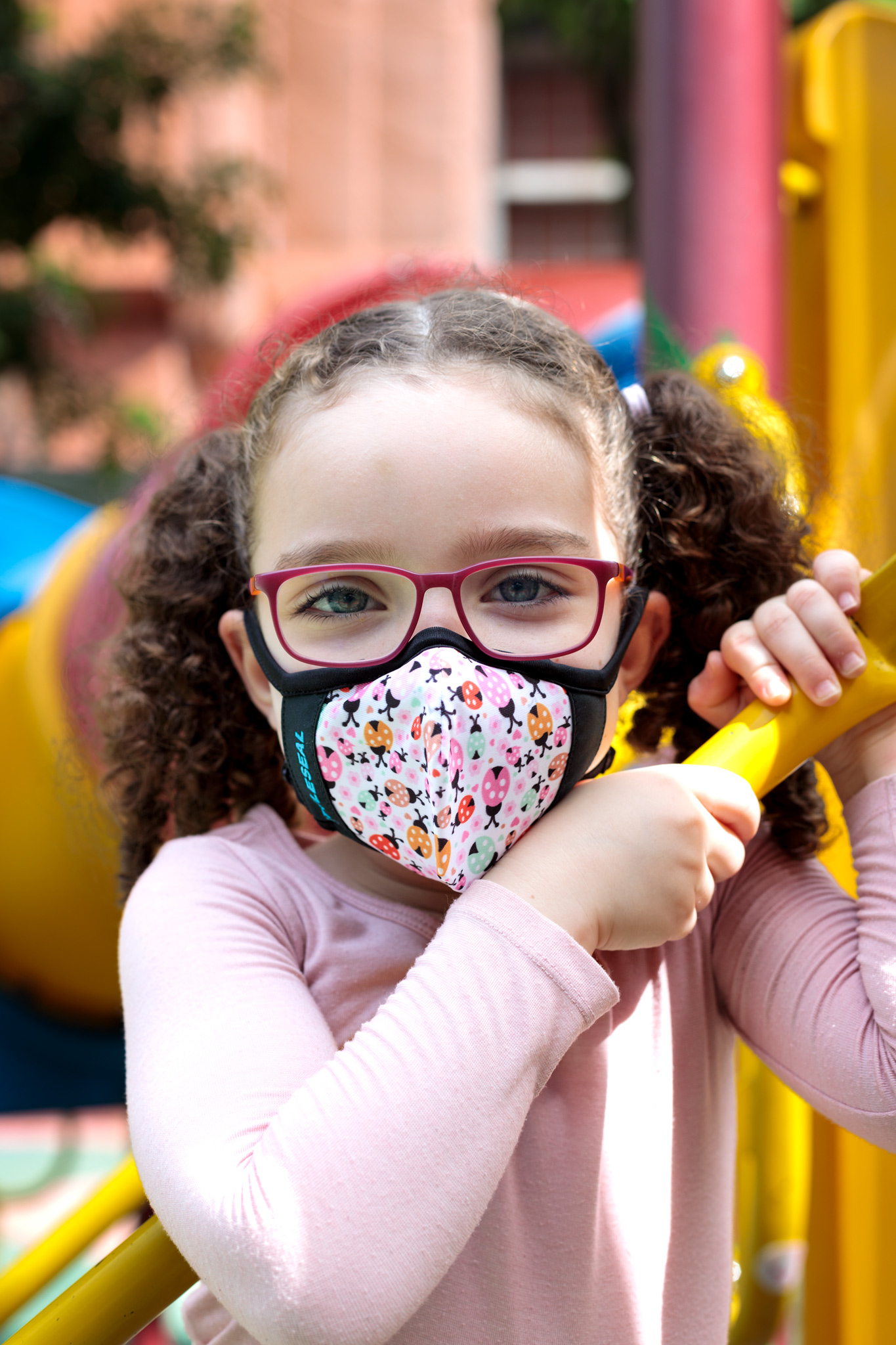 girl wearing styleseal pro ladybug mask