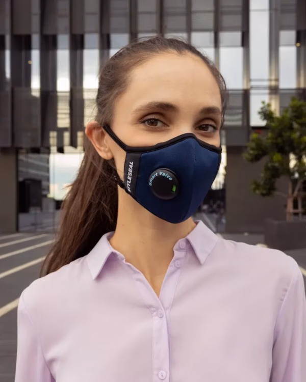 Woman wearing STYLESEAL AIR+ KN95 mask in royal blue
